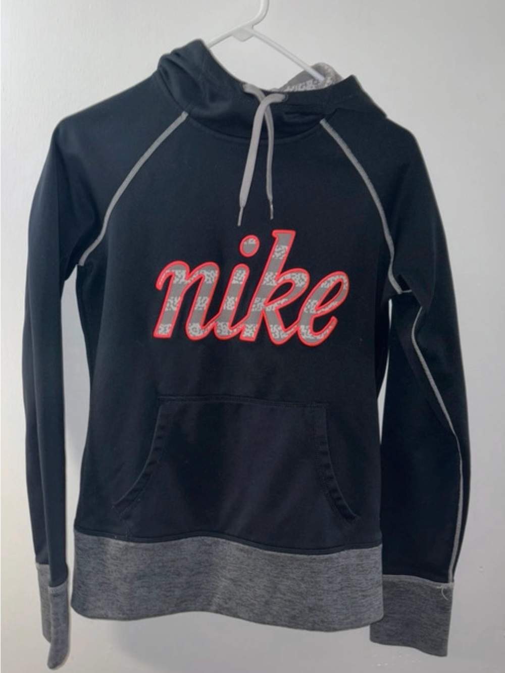Nike Black Crewneck Sweatshirt with Red Script Logo and Gray Trim